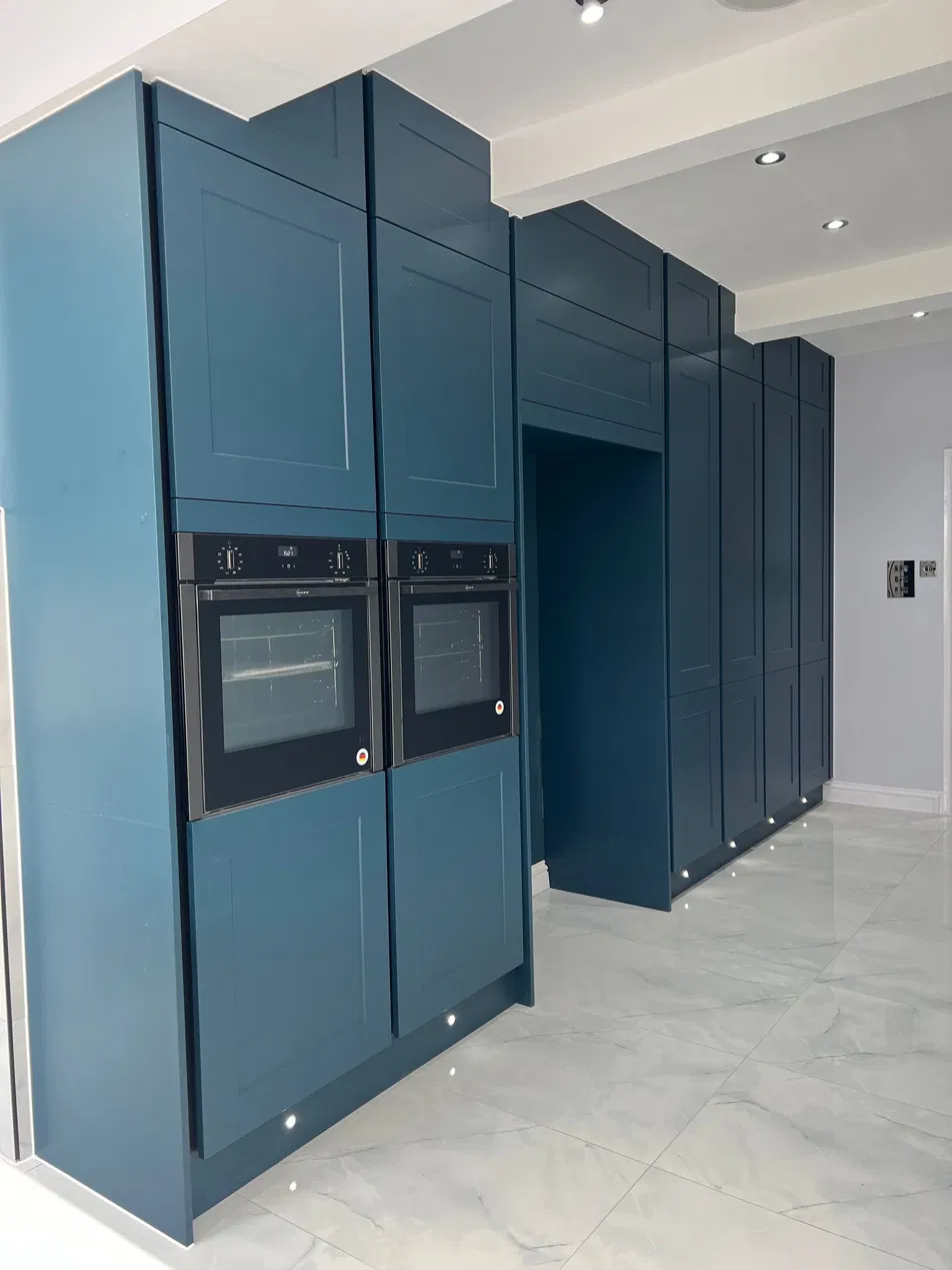 Full-height kitchen cabinets and ovens